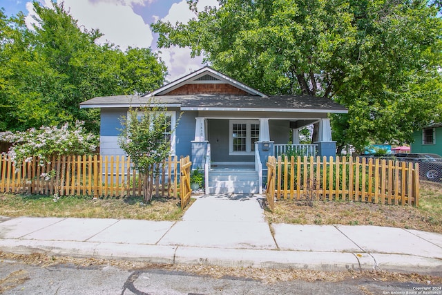 bungalow-style home with covered porch