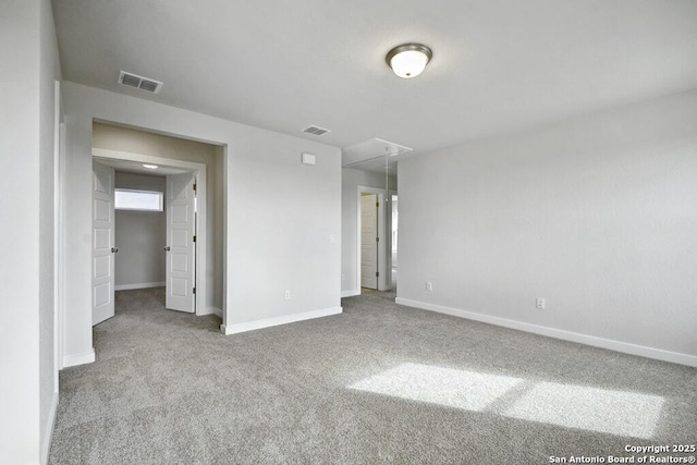 unfurnished bedroom featuring carpet