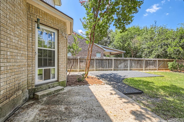 view of yard with a patio and a fenced backyard