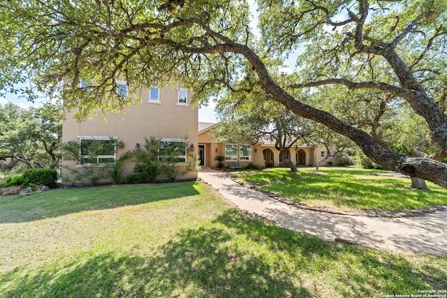 view of front of home with a front lawn