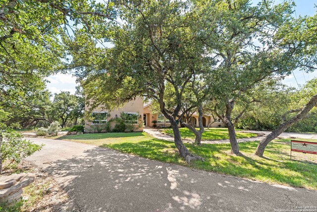 view of front of property with a front lawn