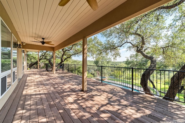 wooden deck with ceiling fan