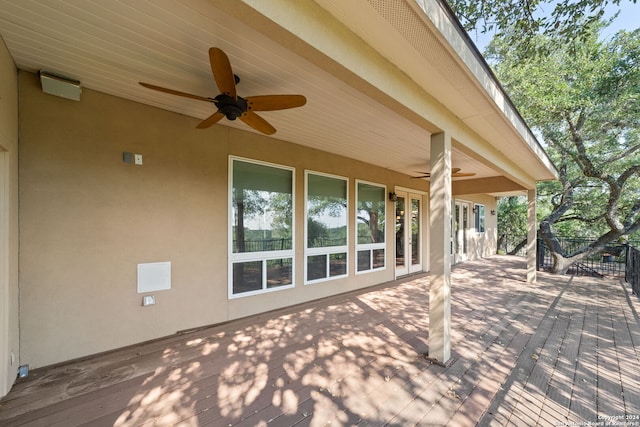 wooden deck with ceiling fan