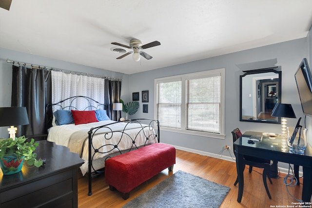 bedroom featuring ceiling fan and light hardwood / wood-style floors