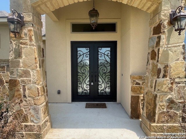 entrance to property with french doors