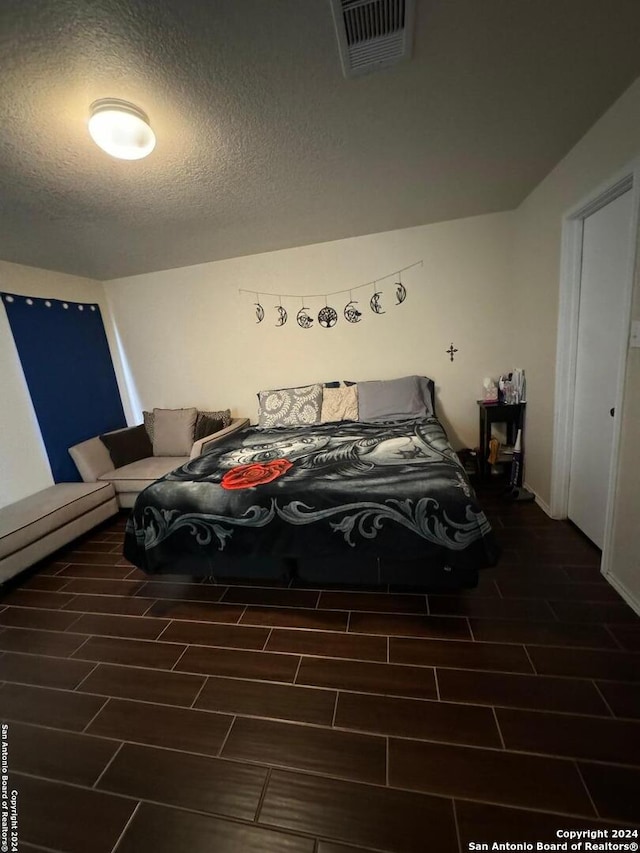 bedroom with a textured ceiling