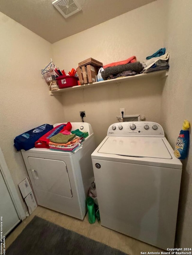 laundry room featuring washer and dryer