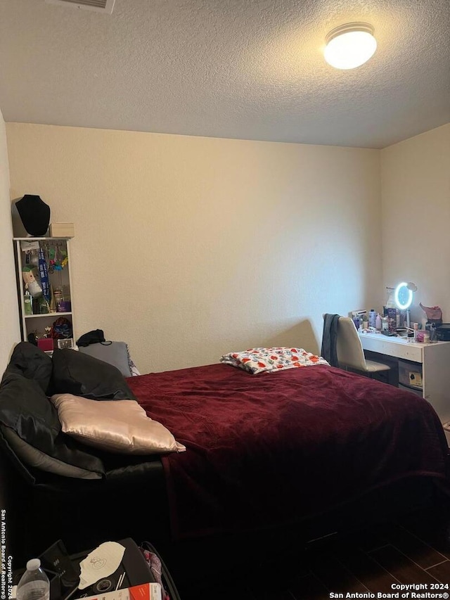 534 Gable Pt, San Antonio, TX 78251 - bedroom featuring a textured ceiling