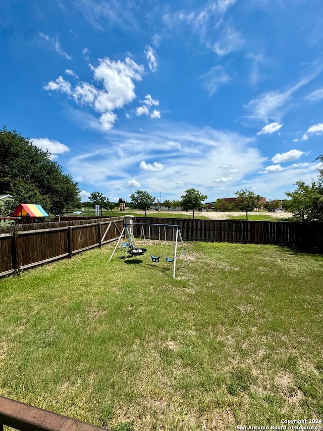 view of yard with a playground