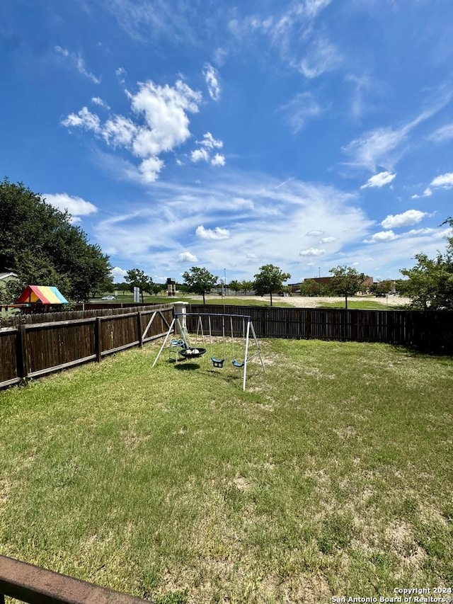 534 Gable Pt, San Antonio, TX 78251 - view of yard with a fenced backyard and a playground
