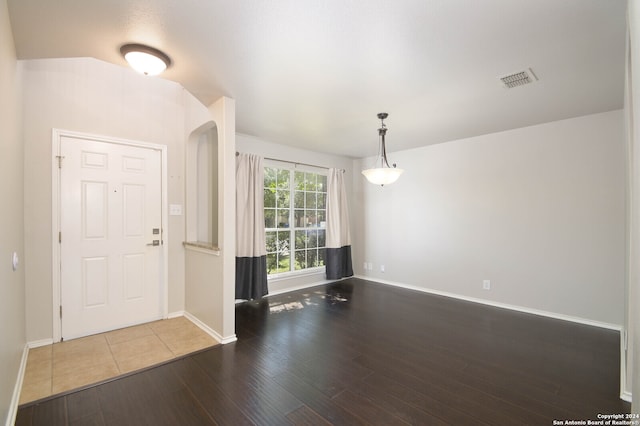 foyer entrance featuring hardwood / wood-style floors