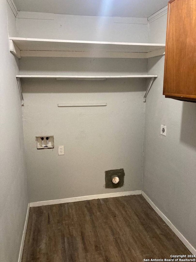 laundry room featuring dark wood-type flooring, baseboards, washer hookup, laundry area, and electric dryer hookup