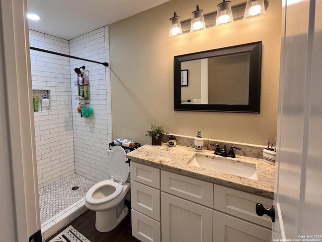 448 Melody, Uvalde, TX 78801 - bathroom featuring a stall shower, toilet, and vanity