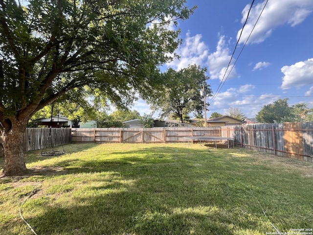 448 Melody, Uvalde, TX 78801 - view of yard with a trampoline