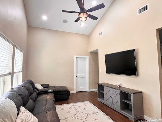 living room featuring high vaulted ceiling, dark wood-type flooring, and ceiling fan