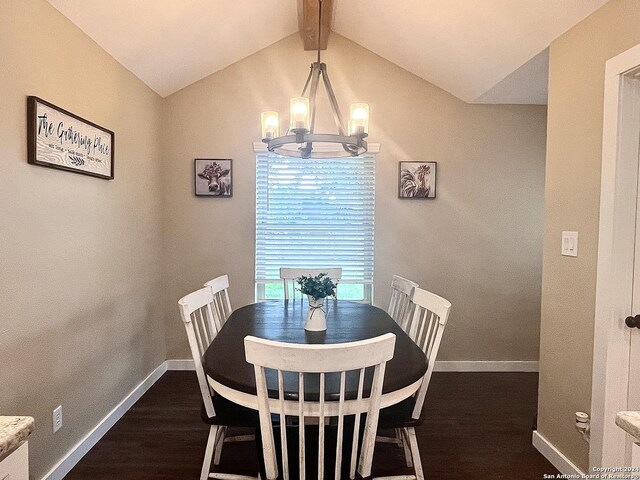 448 Melody, Uvalde, TX 78801 - dining area with dark wood finished floors, a chandelier, and baseboards