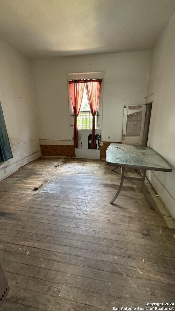 interior space with hardwood / wood-style flooring