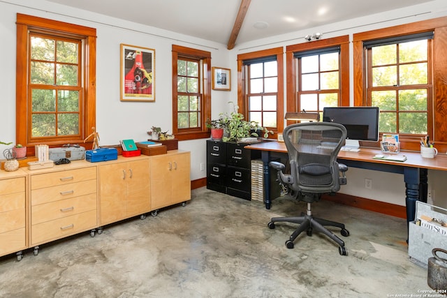 office space featuring beamed ceiling