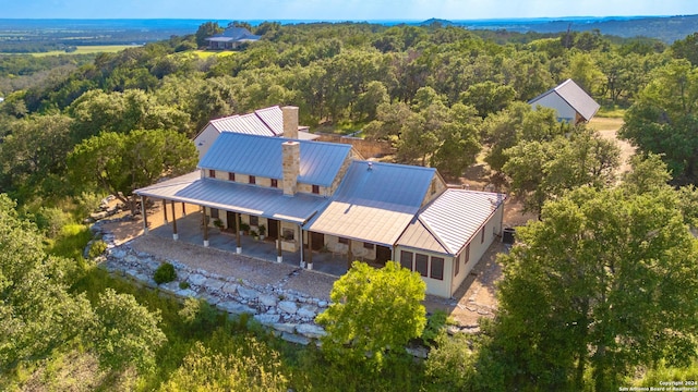 bird's eye view with a view of trees