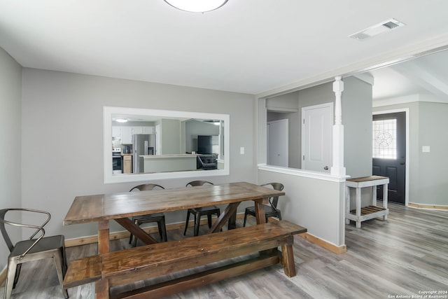 dining area featuring light wood-type flooring