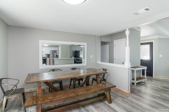 202 Cedar Hill Rd, Pipe Creek, TX 78063 - dining area with baseboards, light wood finished floors, and visible vents