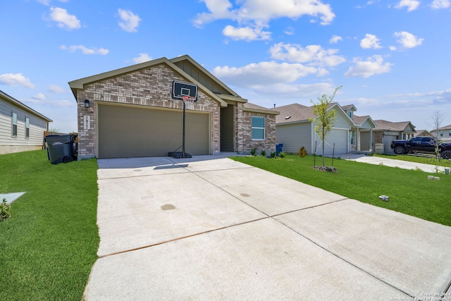 view of front of home featuring a garage and a front lawn