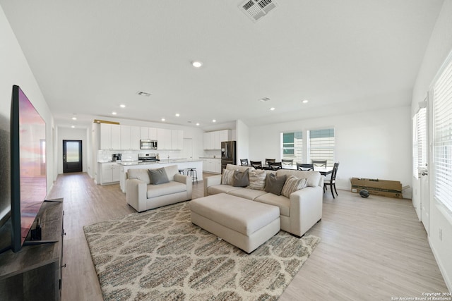 living room featuring light hardwood / wood-style floors