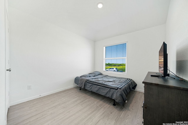 bedroom featuring light hardwood / wood-style floors