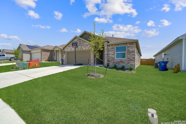 single story home with a front yard and a garage