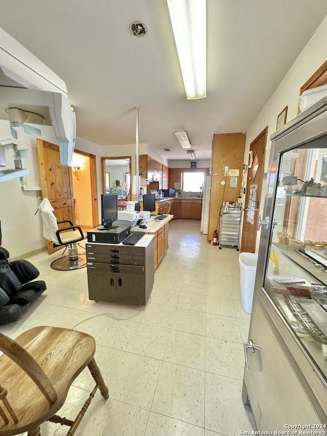 kitchen featuring a textured ceiling