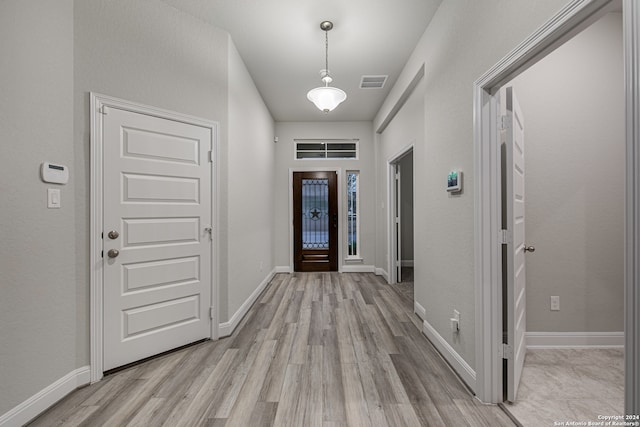 foyer entrance featuring light wood-type flooring