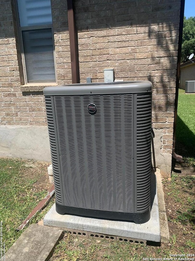 exterior details featuring cooling unit