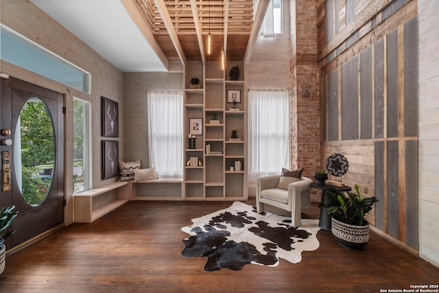 215 Beauregard, San Antonio, TX 78204 - sitting room with plenty of natural light, wood walls, and wood finished floors
