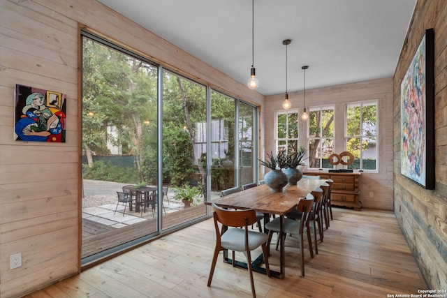 215 Beauregard, San Antonio, TX 78204 - dining space with wood walls and hardwood / wood-style floors