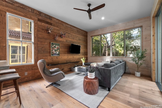 215 Beauregard, San Antonio, TX 78204 - living area with light wood-type flooring, a ceiling fan, wooden walls, and recessed lighting