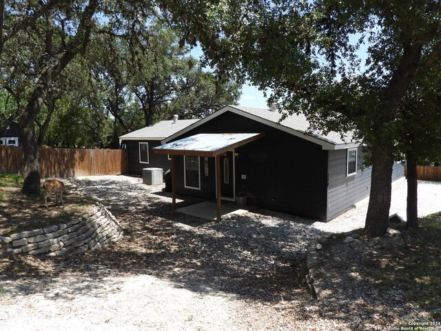 view of front of property with central AC unit