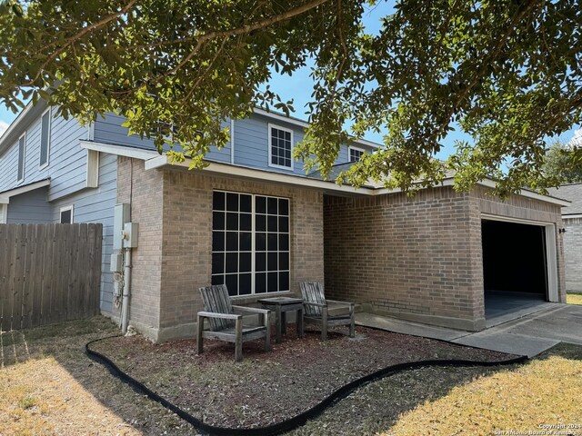 view of front property with a front yard and a garage