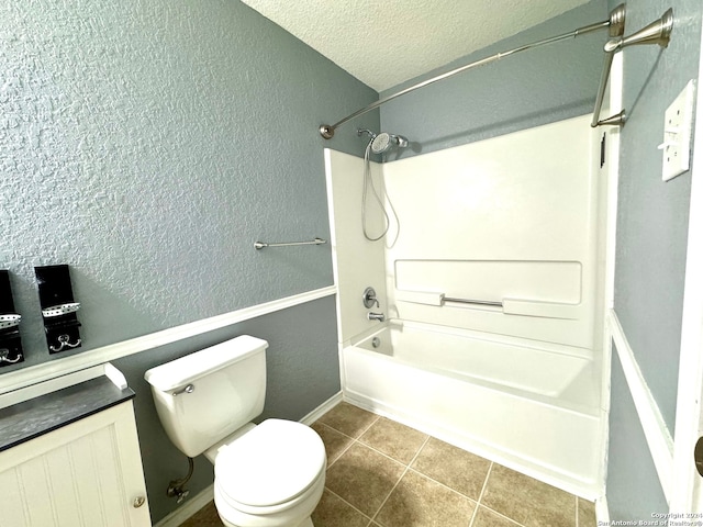 bathroom with a textured ceiling, toilet, tile patterned flooring, and shower / bath combination