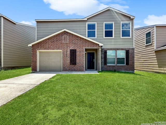 view of front facade featuring a garage and a front lawn