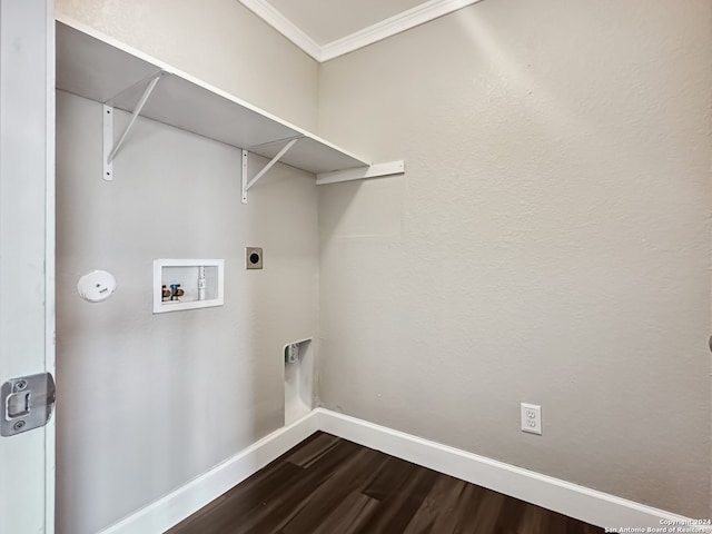 washroom featuring electric dryer hookup, hardwood / wood-style flooring, ornamental molding, and washer hookup