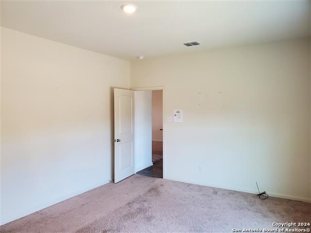 empty room with carpet floors