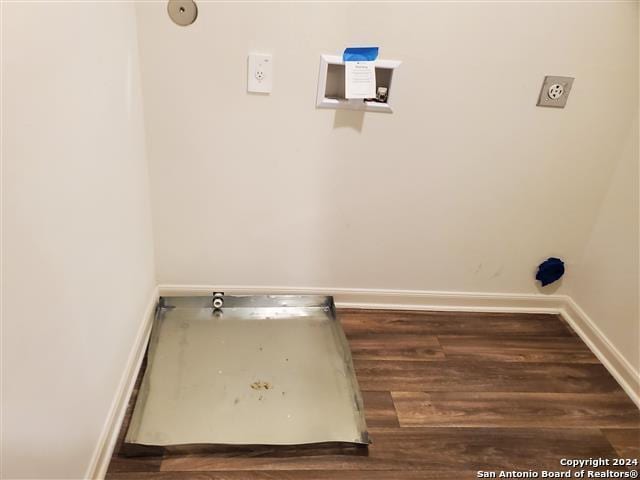 laundry area featuring washer hookup and dark hardwood / wood-style floors