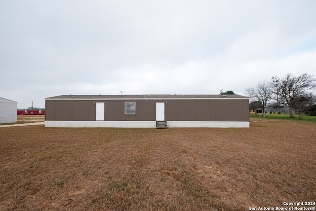 exterior space featuring a yard