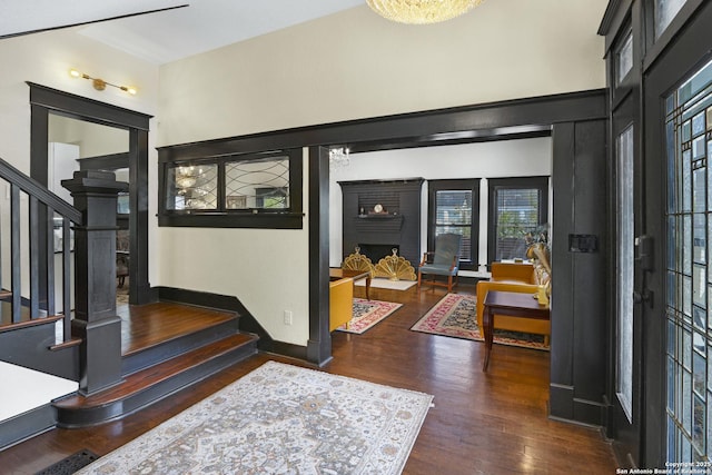 223 E Craig Pl, San Antonio, TX 78212 - entryway with stairs, wood finished floors, and a fireplace