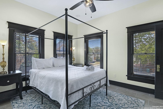 223 E Craig Pl, San Antonio, TX 78212 - tiled bedroom with a ceiling fan
