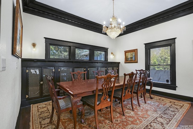 223 E Craig Pl, San Antonio, TX 78212 - dining area with a chandelier, ornamental molding, and wood finished floors