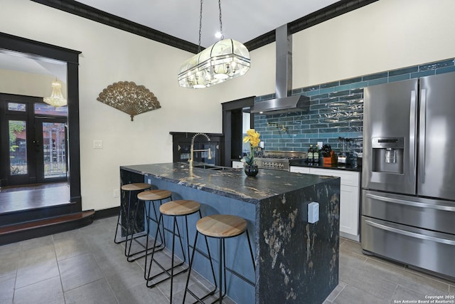 223 E Craig Pl, San Antonio, TX 78212 - kitchen featuring stainless steel fridge with ice dispenser, extractor fan, tile patterned flooring, and backsplash