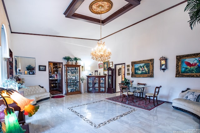 living room with ornamental molding, tile patterned floors, a high ceiling, and an inviting chandelier