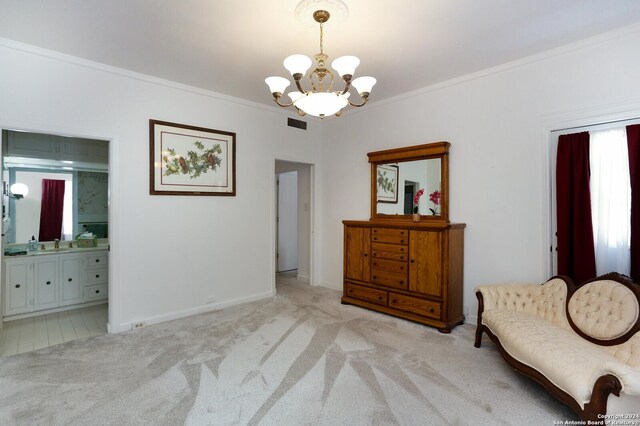 living area with light tile patterned floors, crown molding, and a chandelier