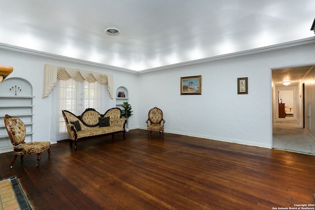 sitting room featuring wood-type flooring and french doors